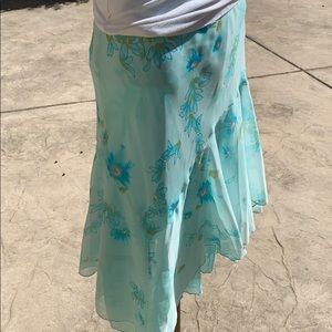 Sheer teal floral skirt .